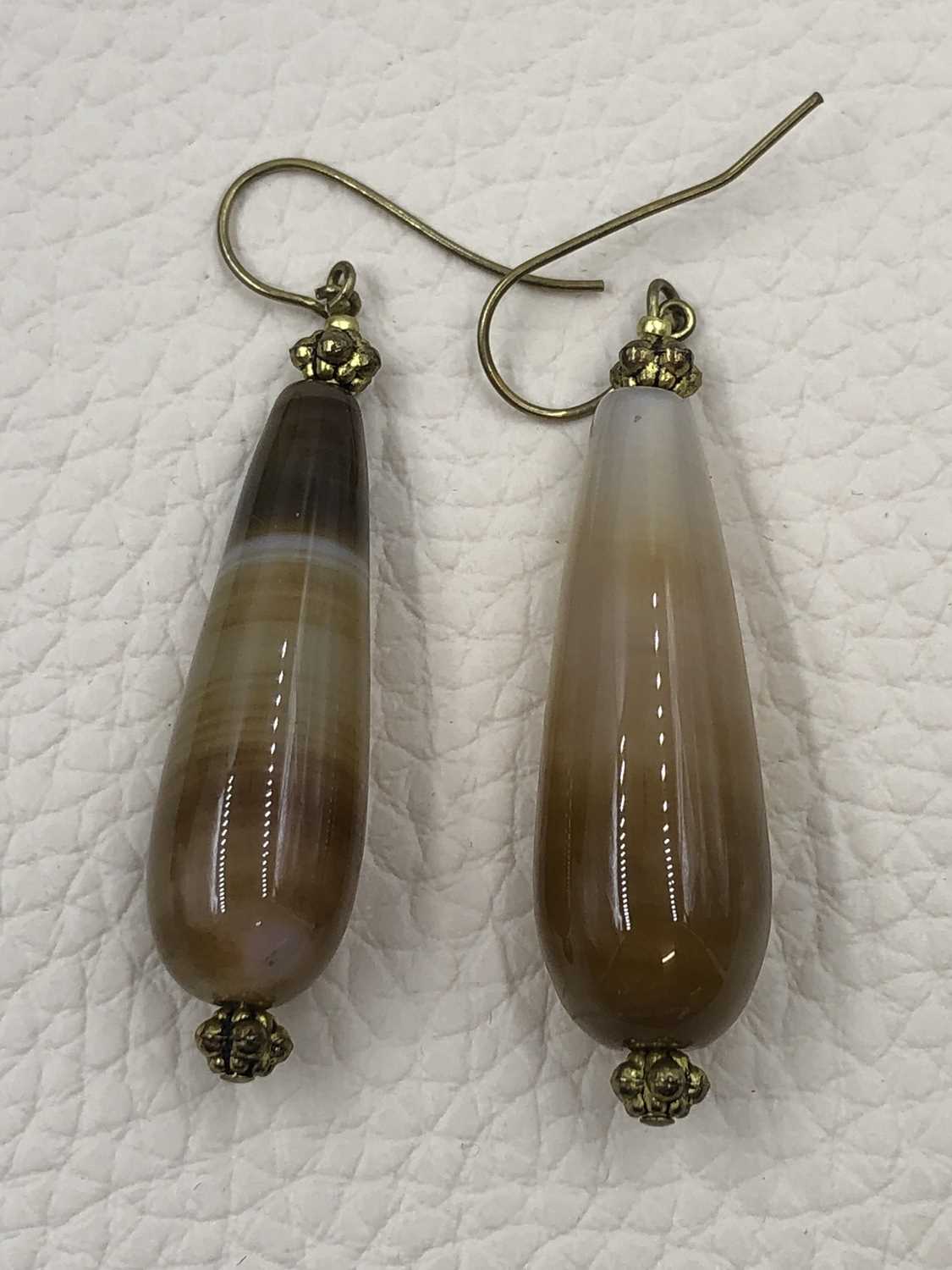 Lot 31 - A pair of vintage elongated, large agate drop...