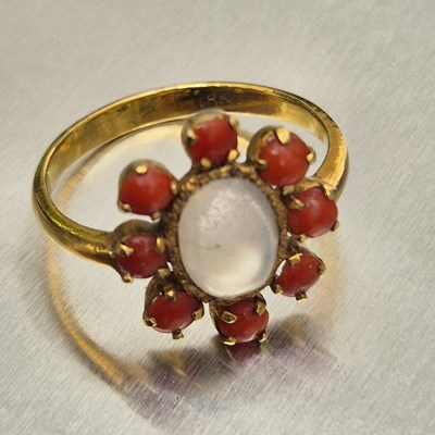 Lot 63 - A vintage moonstone and coral cluster ring....