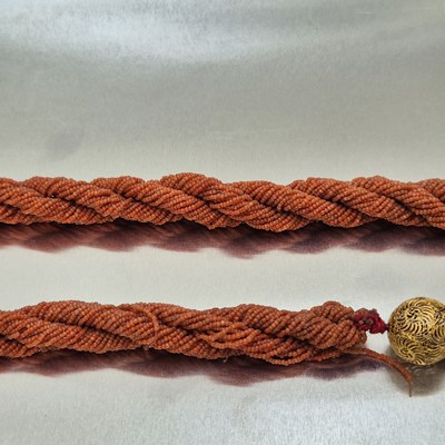 Lot 65 - An antique coral-beaded multi-strand rope...