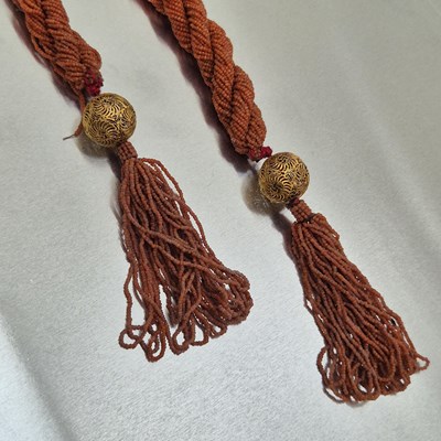 Lot 65 - An antique coral-beaded multi-strand rope...