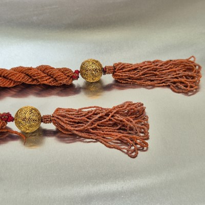 Lot 65 - An antique coral-beaded multi-strand rope...