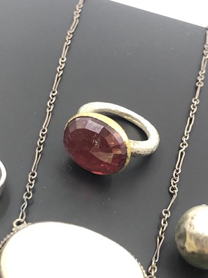 Lot 41 - A Chinese mother-of-pearl carved panel pendant...