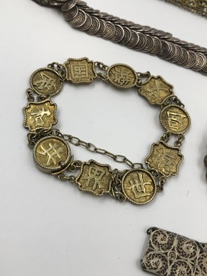 Lot 42 - A Chinese silver gilt character panel bracelet...