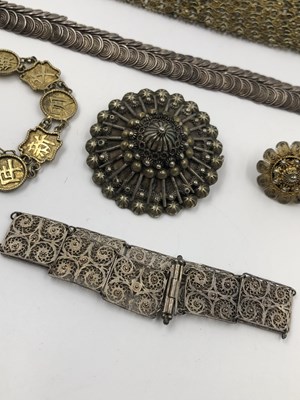 Lot 42 - A Chinese silver gilt character panel bracelet...