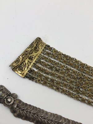 Lot 42 - A Chinese silver gilt character panel bracelet...