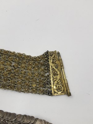 Lot 42 - A Chinese silver gilt character panel bracelet...