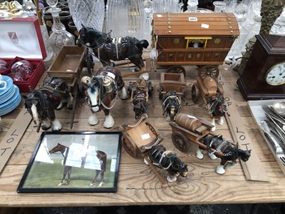 Lot 507 - Eight pottery cart horses together with carts...