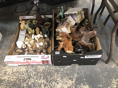 Lot 528 - A collection of carved wooden and ceramic...