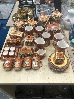 Lot 535 - A collection of cottage form breakfast wares