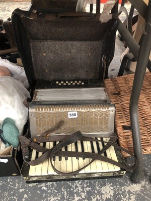 Lot 550 - A cased Tasso piano accordion