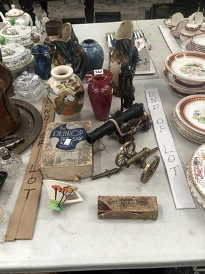Lot 552 - Two majolica fish form jugs, three toy cannons,...