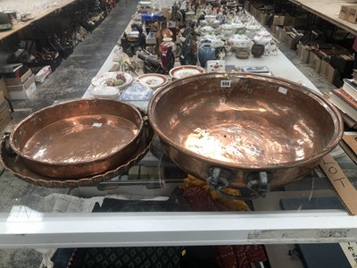 Lot 555 - Three eastern copper shallow bowls
