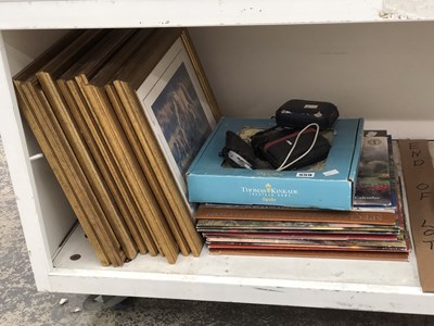 Lot 559 - Framed prints and pictures, calendars in...