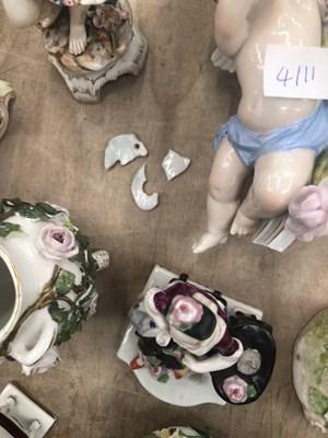 Lot 565 - German porcelain figures, two 19th century...