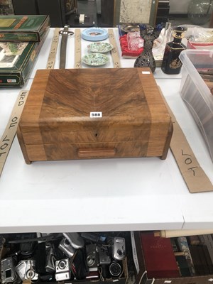 Lot 588 - An Art Deco walnut cased canteen of...