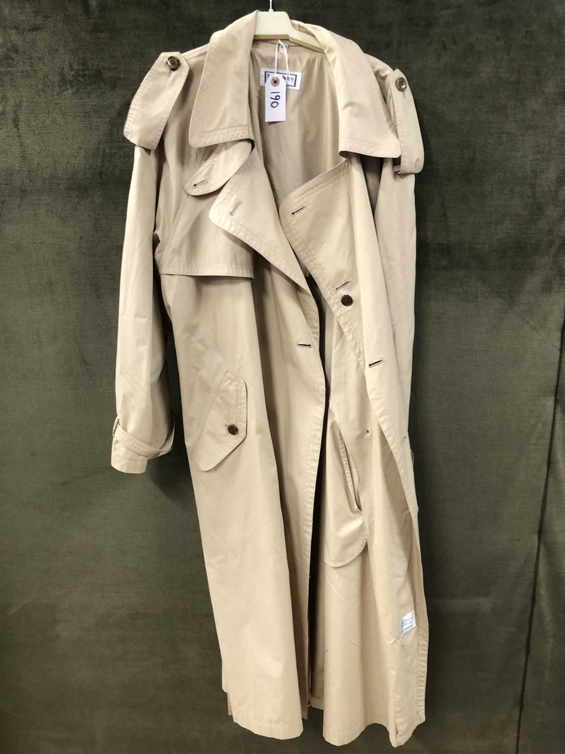 Lot 190 - A Yves Saint Laurent long ladies' trench coat....