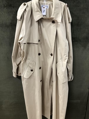 Lot 190 - A Yves Saint Laurent long ladies' trench coat....