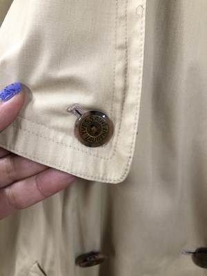 Lot 190 - A Yves Saint Laurent long ladies' trench coat....