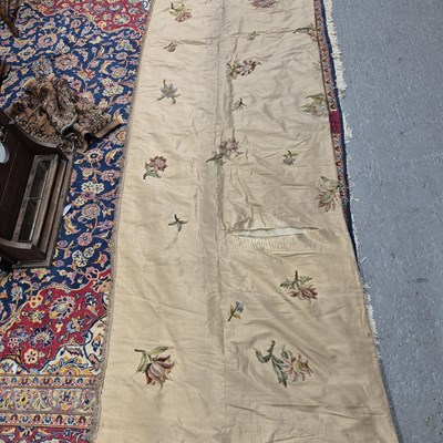 Lot 286 - A lined pale mushroom coloured silk panel sewn...