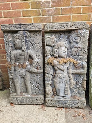 Lot 704 - Two Eastern relief-decorated temple panels.