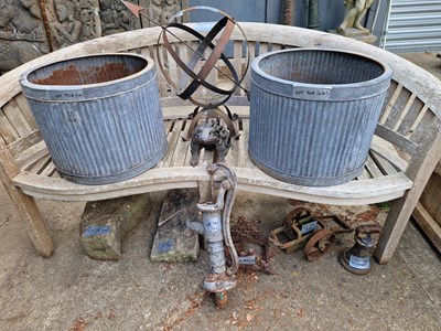 Lot 708 - Two galvanised planters and an armillary...
