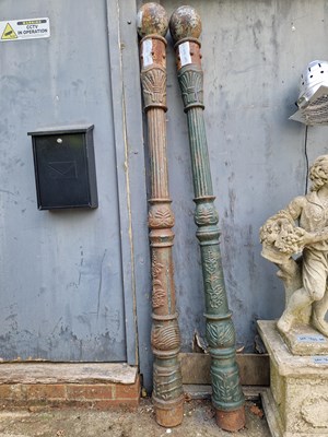 Lot 709 - Two cast-iron lamp posts.