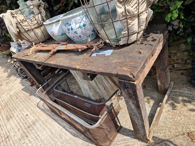 Lot 714 - A large pine workshop bench.
