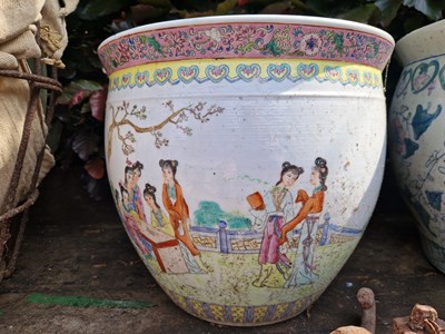 Lot 718 - Two oriental fish bowl form garden planters.