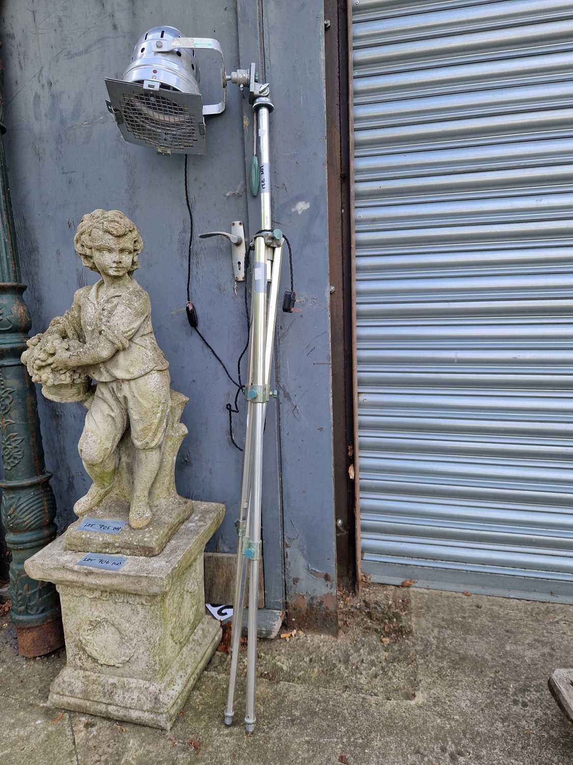 Lot 721 - A spotlight on a tripod stand together with a...