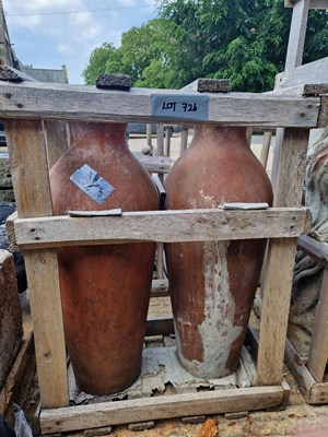Lot 726 - A pair of terracotta vases.