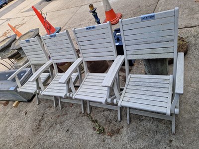 Lot 737 - Four Folding hardwood garden chairs.