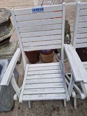 Lot 737 - Four Folding hardwood garden chairs.