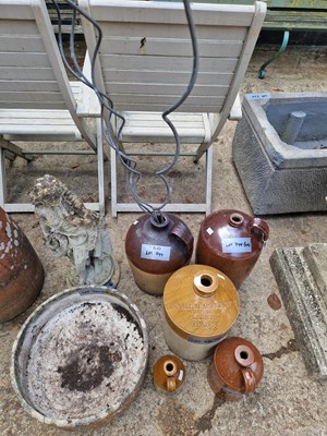 Lot 744 - A stoneware garden figure, a planter and...