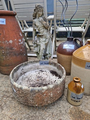 Lot 744 - A stoneware garden figure, a planter and...