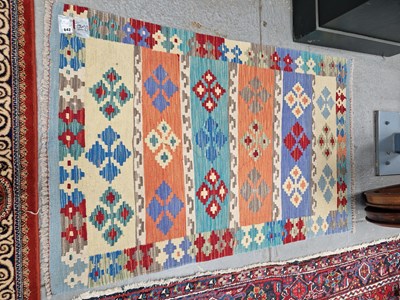 Lot 642 - A decorative Kelim rug. 158 x 103cms