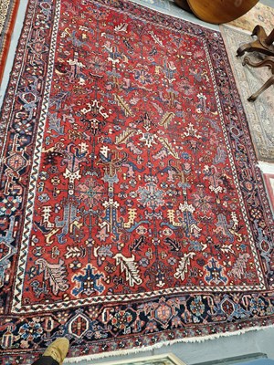 Lot 643 - A Persian Heriz carpet. 340 x 230cms