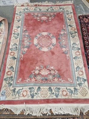 Lot 646 - A Chinese Aubusson design rug. 180 x 122cms,...