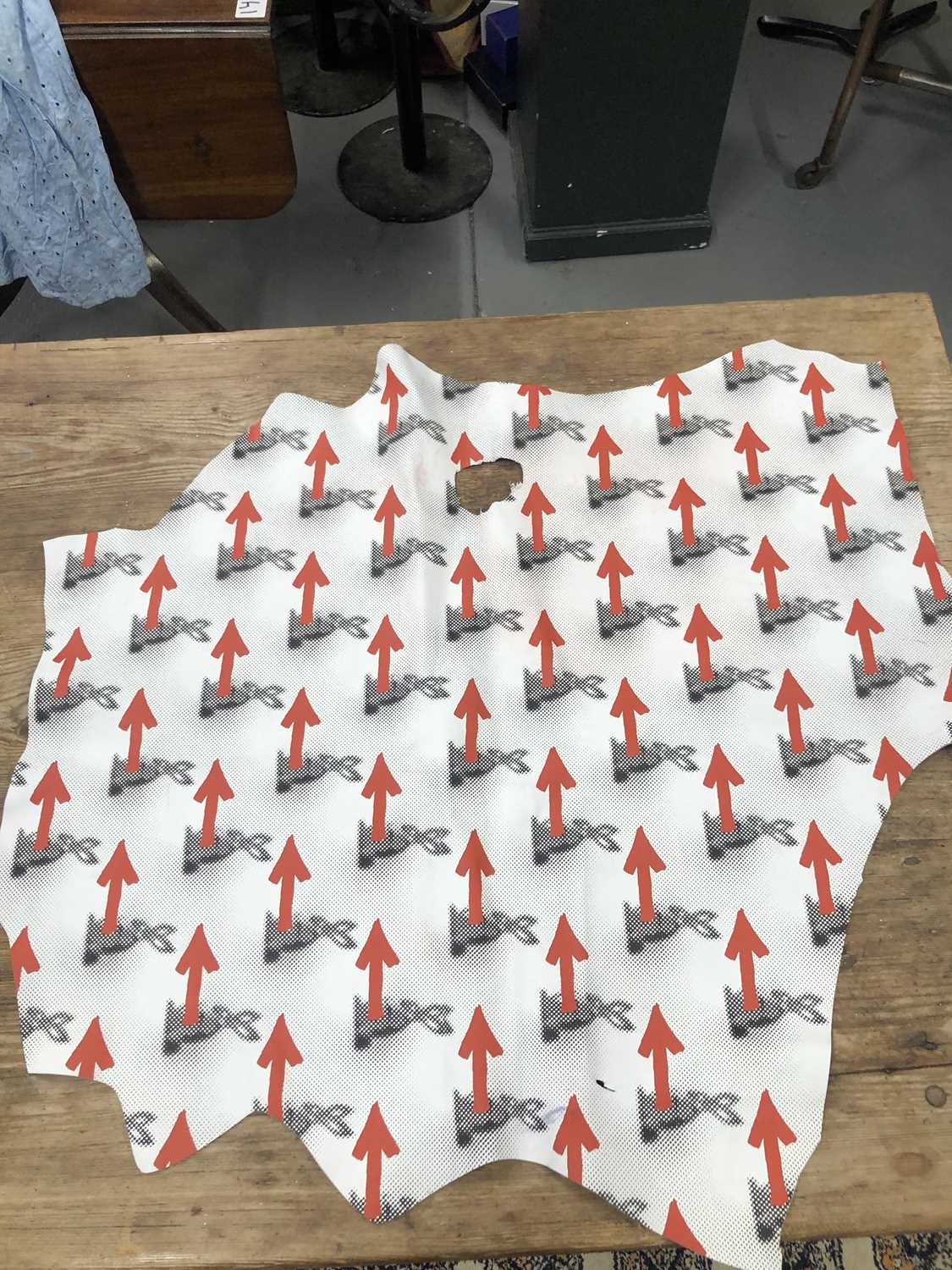 Lot 194 - A printed hide leather panel.