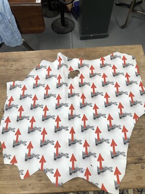 Lot 194 - A printed hide leather panel.