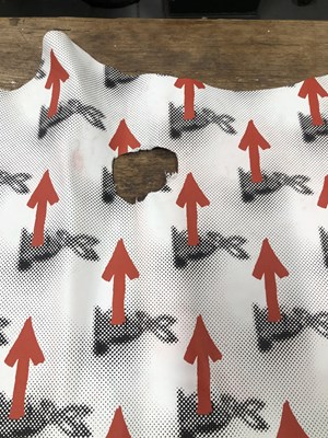 Lot 194 - A printed hide leather panel.