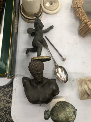 Lot 592 - A three light table lamp supported by a Cupid...
