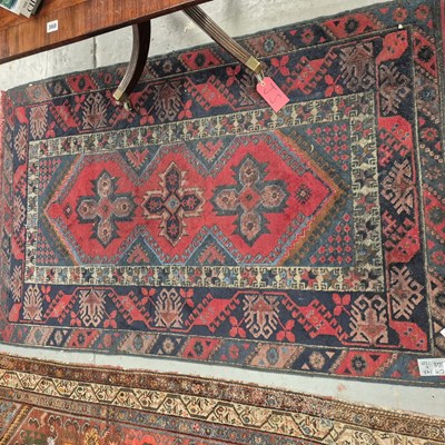 Lot 649 - A Turkish tribal rug. 192 x 120cms 
Prov....