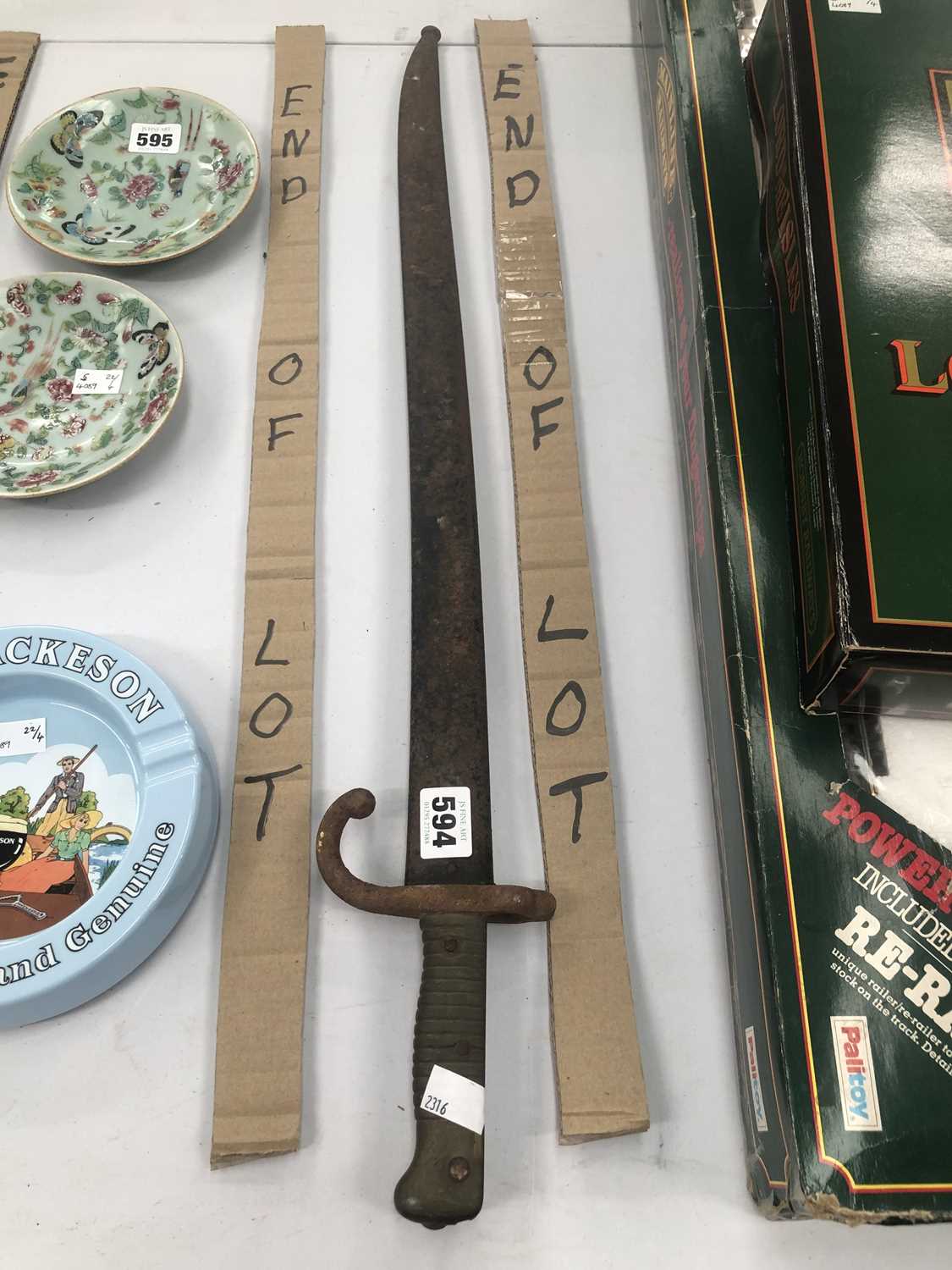 Lot 594 - An 1873 pattern French bayonet and iron scabbard