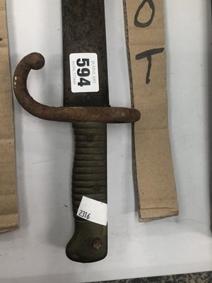 Lot 594 - An 1873 pattern French bayonet and iron scabbard