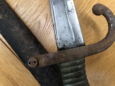 Lot 594 - An 1873 pattern French bayonet and iron scabbard