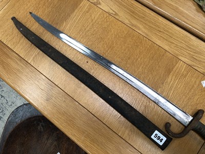 Lot 594 - An 1873 pattern French bayonet and iron scabbard