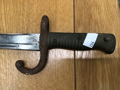 Lot 594 - An 1873 pattern French bayonet and iron scabbard