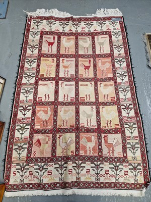 Lot 658 - A tribal flatweave rug