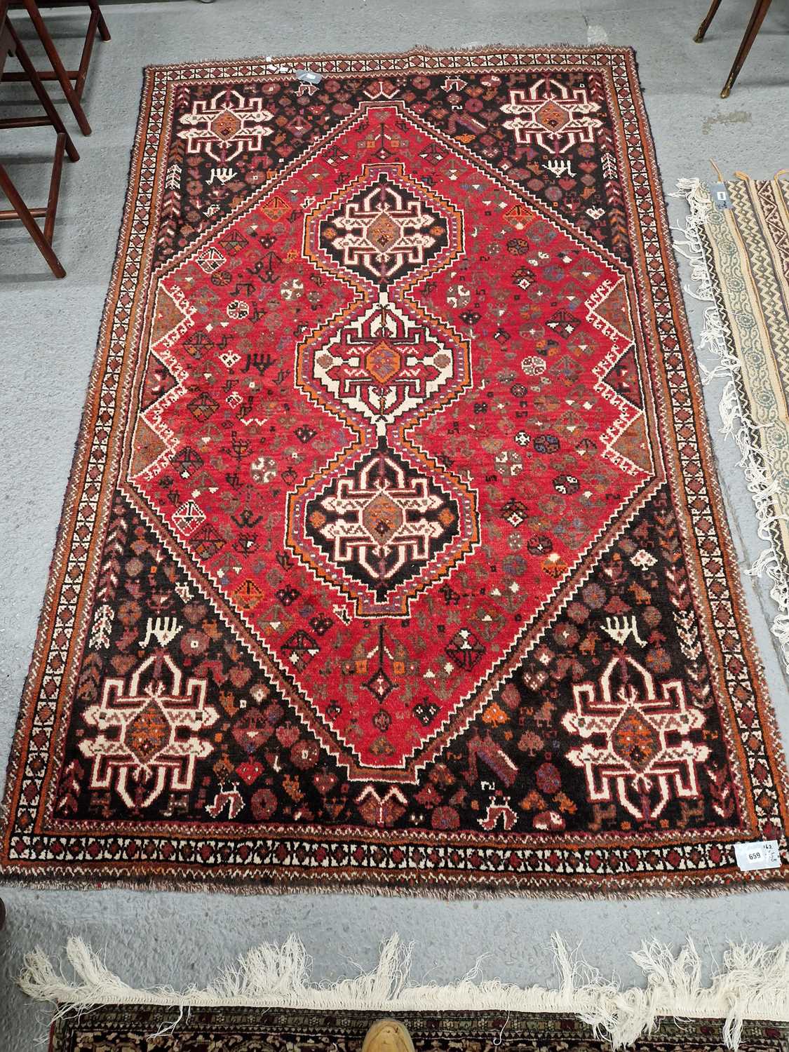 Lot 659 - A Persian Shiraz rug