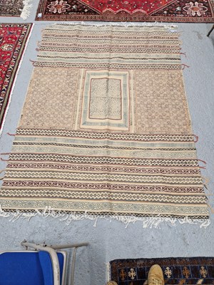Lot 660 - A tribal flatweave rug